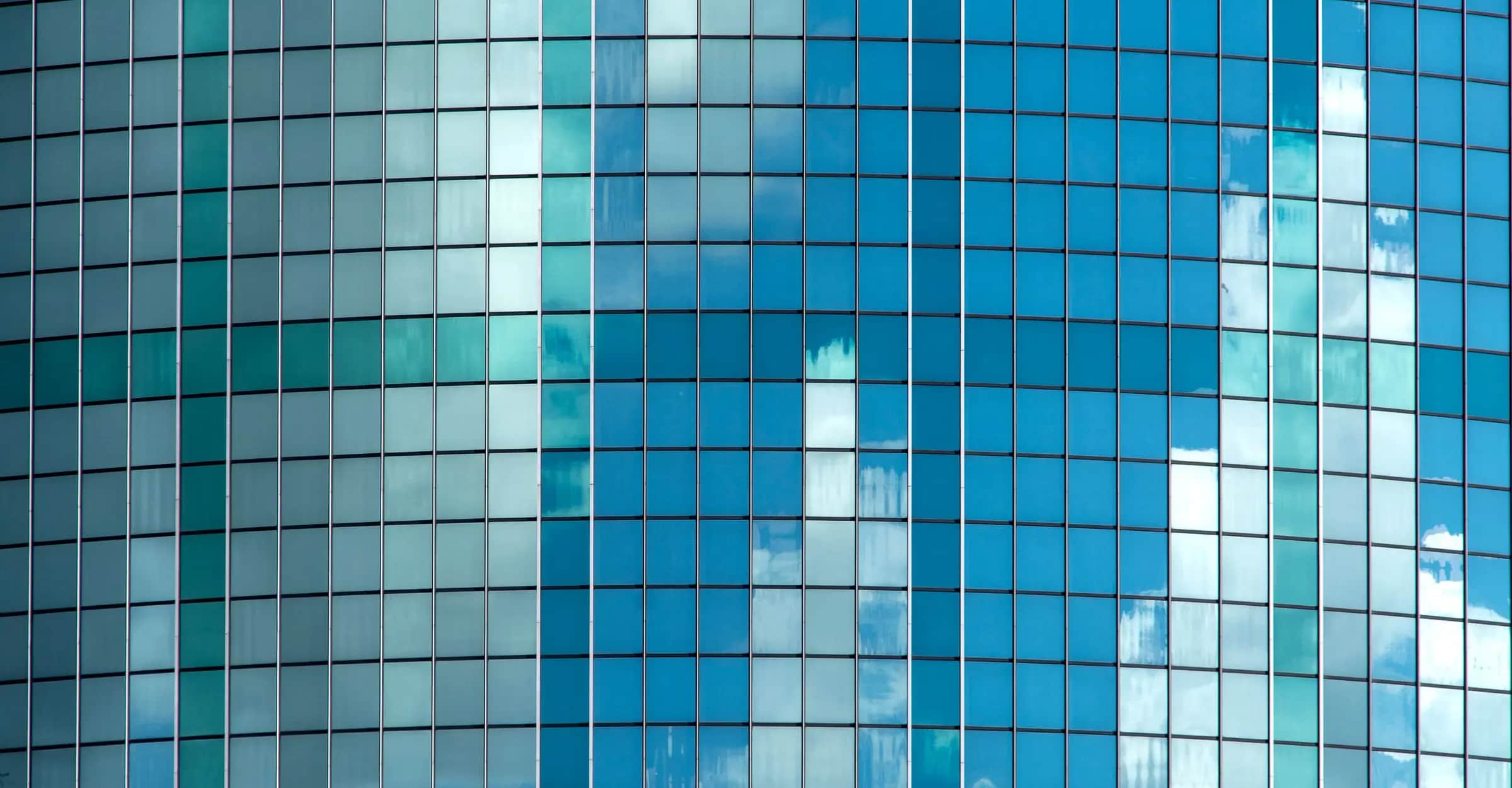 Modern office tower with a gridded glass facade